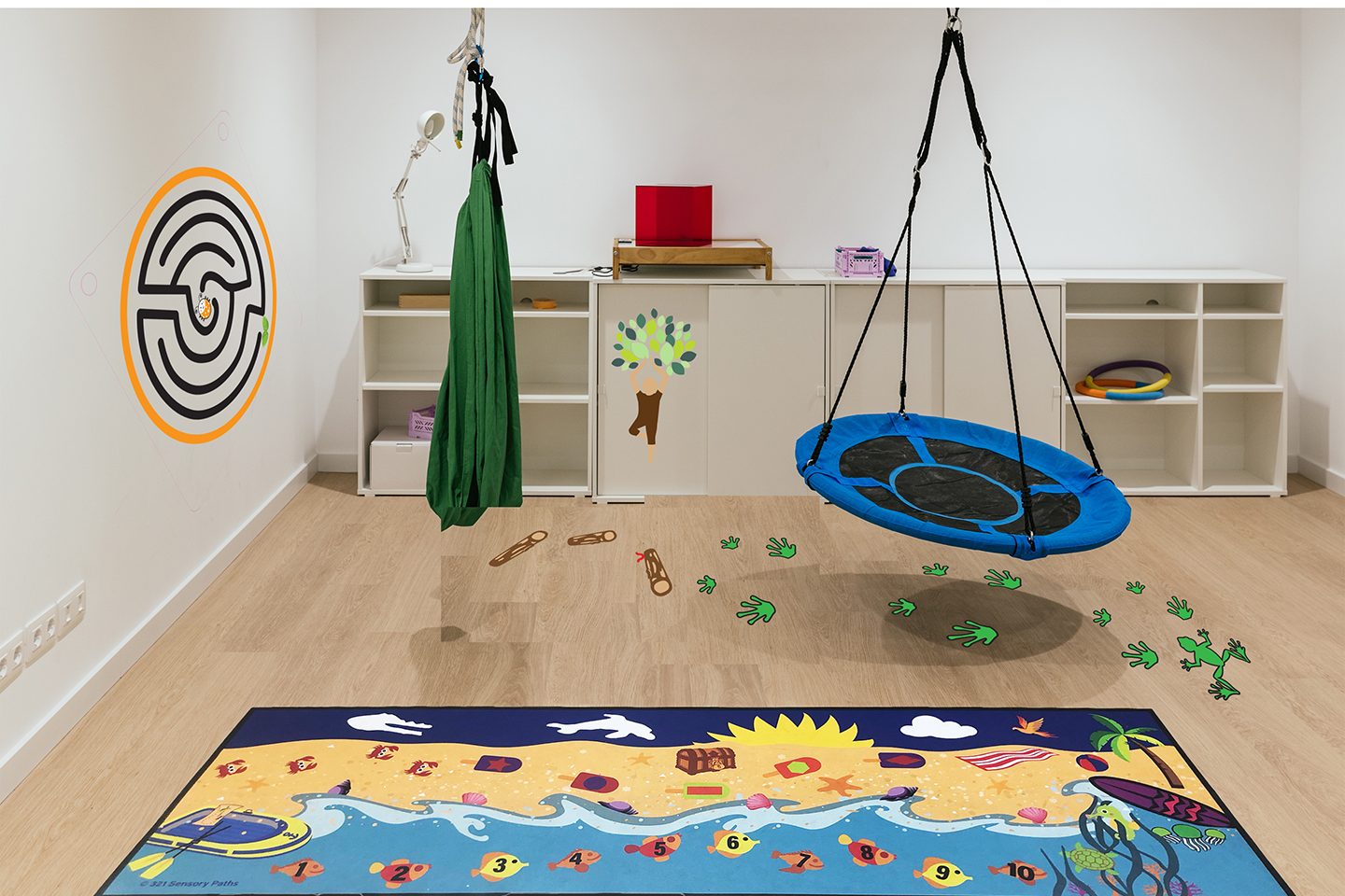 sensory room with sensory mat and wall graphic