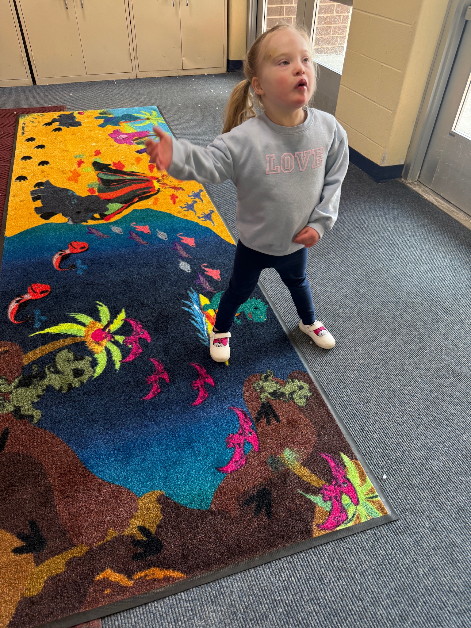 girl on a dino sensory paths